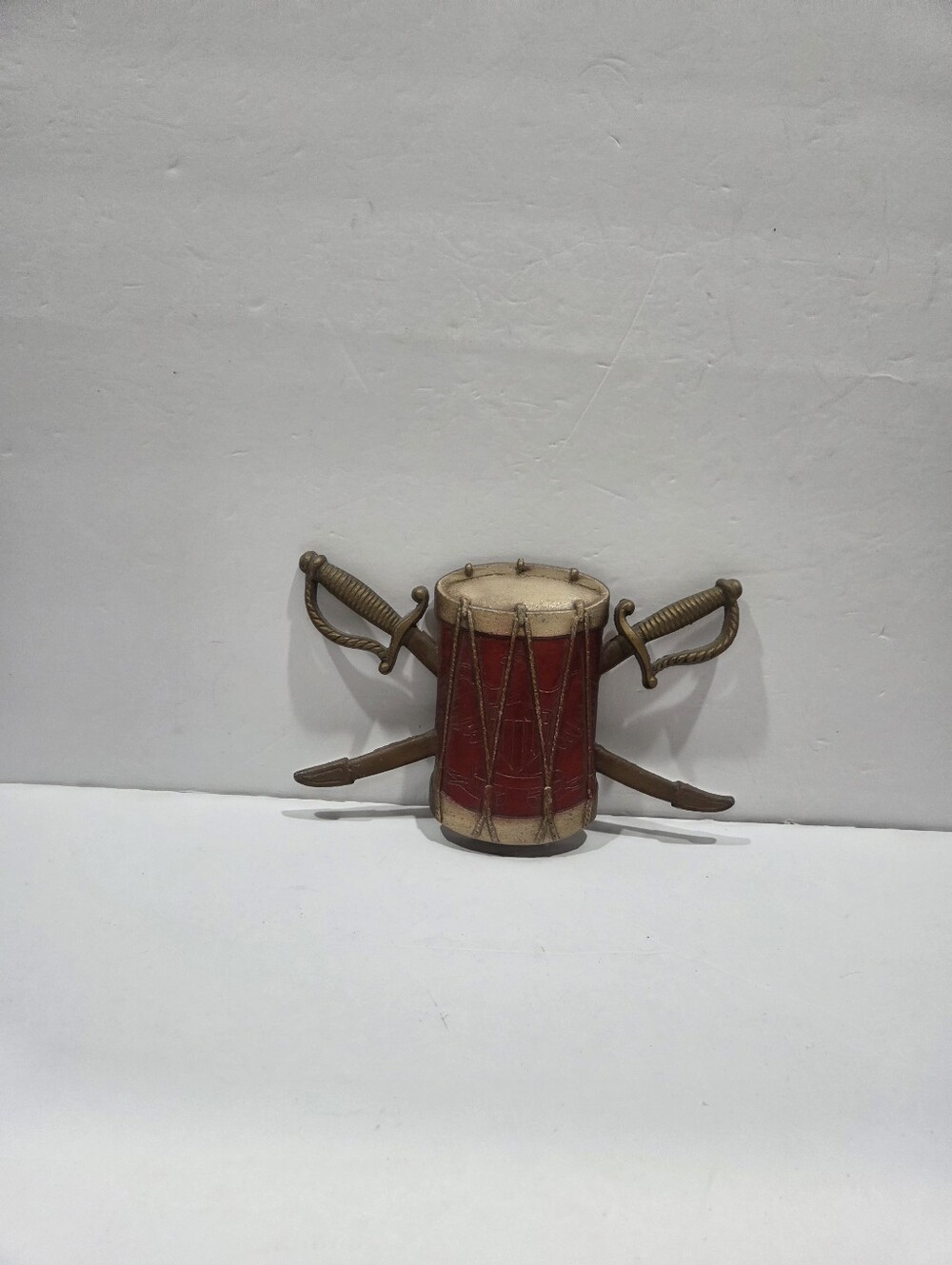 Vintage Sexton Metal Wall Plague Red Decorative Drum Accent with Brass Swords